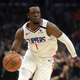 Reggie Jackson of the LA Clippers dribbles upcourt during the first half of a game against the Memphis Grizzlies at Staples Center on February 24, 2020 in Los Angeles, California.